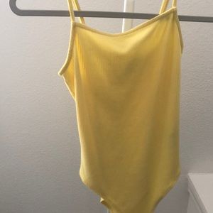 yellow bodysuit